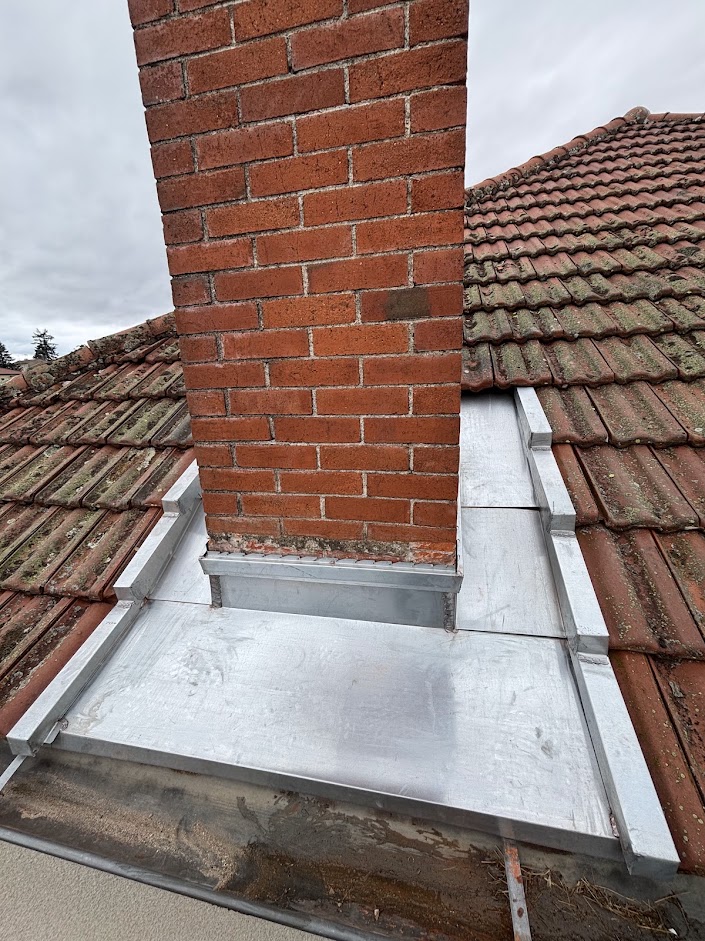 finition de travaux de zinguerie Panissières
